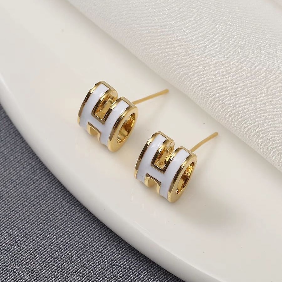 Goldfarbene Huggies mit silberfarbenem Detail