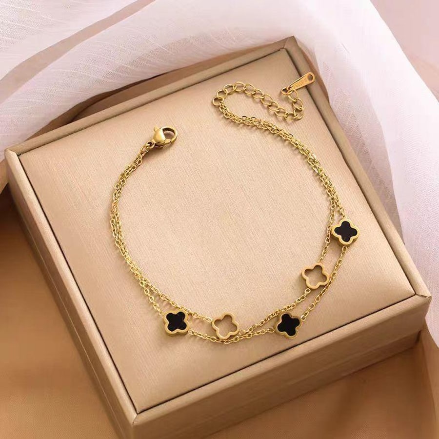 Fusskette mit schwarzen Stationen in Geschenkbox